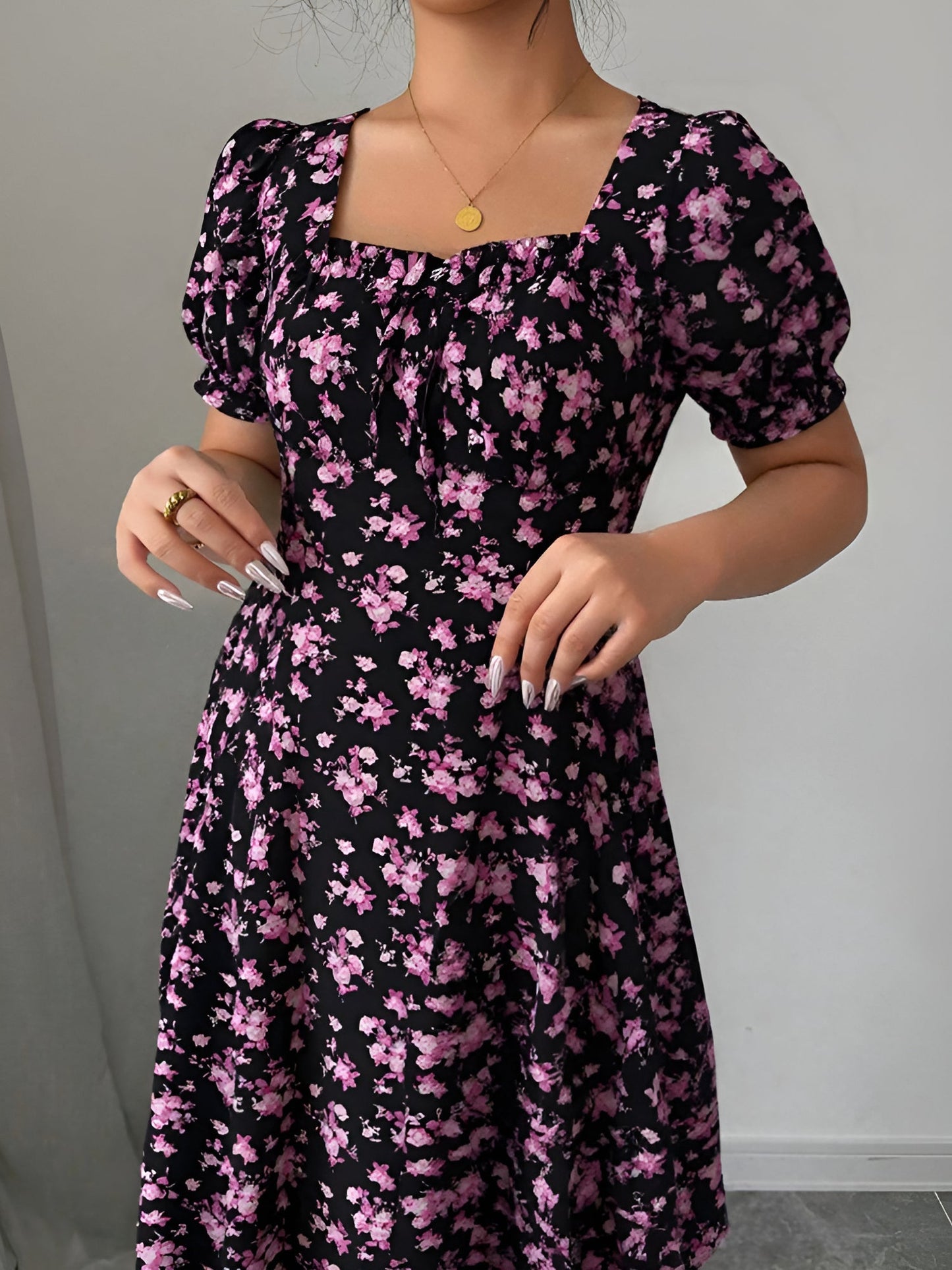 Dark Purple - Woman wearing a floral print midaxi dress with puff sleeves, a square neckline, and a ruched bust detail.