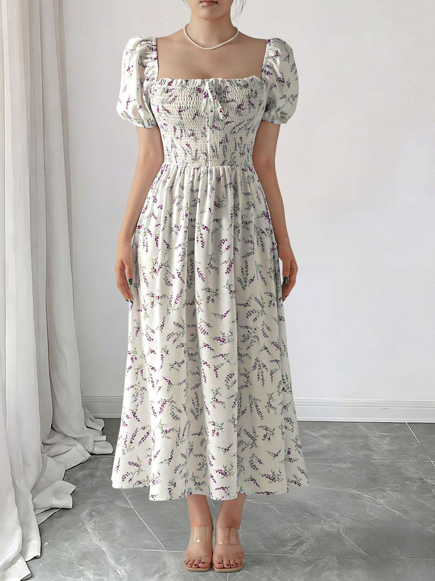 Purple - Woman wearing a woven floral square-neck midi dress with short puff sleeves and a shirred bodice