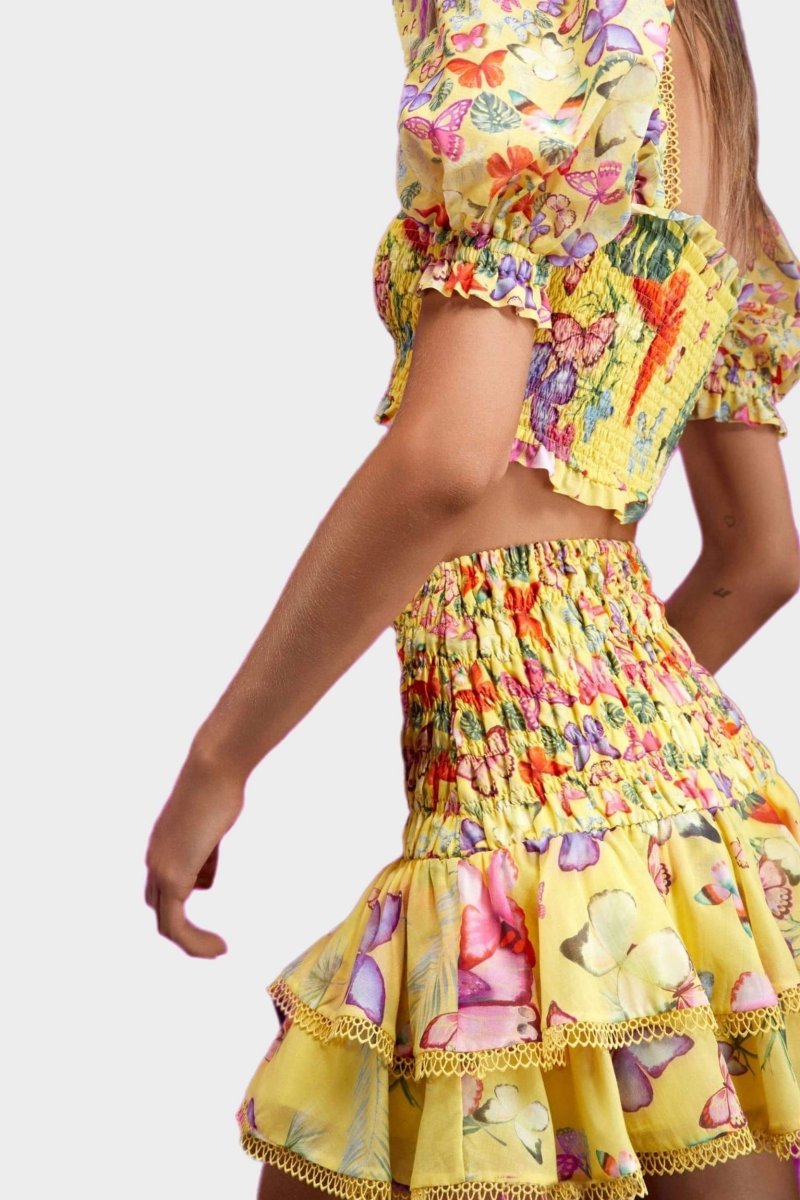 Yellow - Women's white cropped blouse featuring a colourful butterfly and botanical print, a shirred bodice, square neckline, and short puff sleeves, paired with a matching tiered mini skirt.