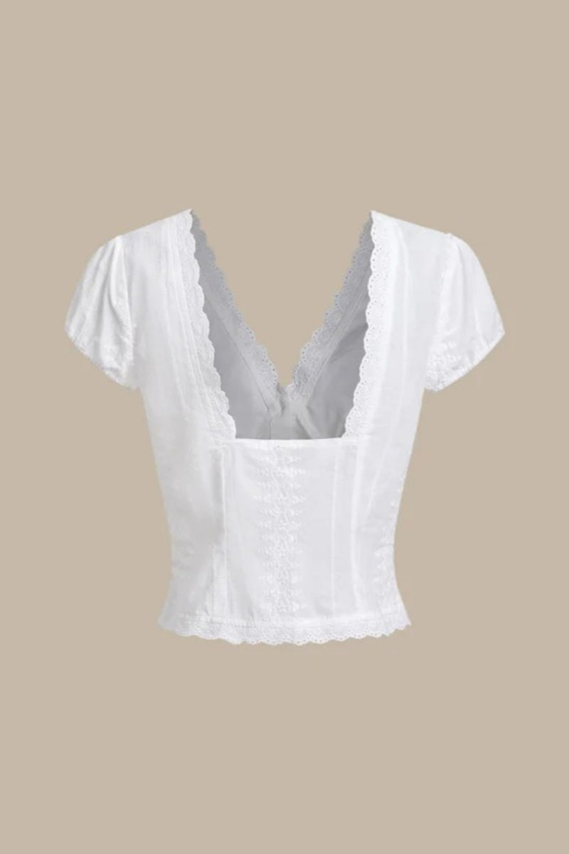 White - Women's white short-sleeve tailored blouse featuring intricate floral embroidery, a deep V-neckline with scalloped lace trim, and a delicate tie-front detail at the bust.