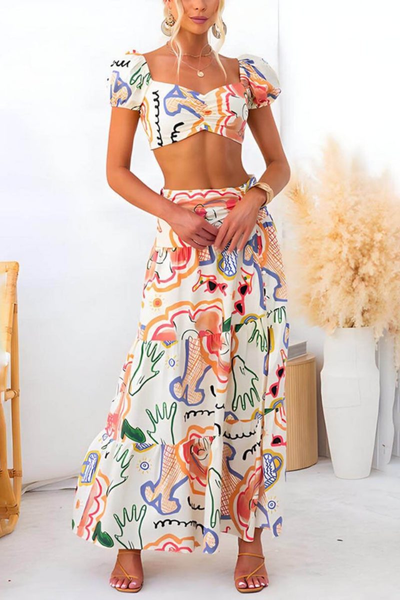Multicolor - Women's two-piece maxi dress featuring a crop top with puff sleeves, a ruched bust, and a high-waisted skirt with a thigh-high slit, all in a colourful abstract graphic print.
