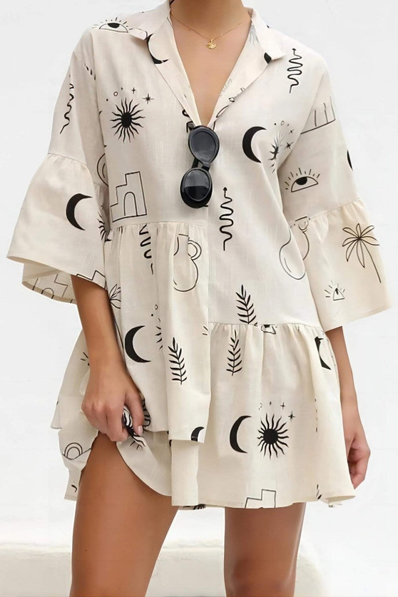 Black - Women's light-coloured mini dress featuring a blue line-art print of suns and vases, styled with a V-neck collar, button front, wide half sleeves, and a voluminous tiered smock silhouette.