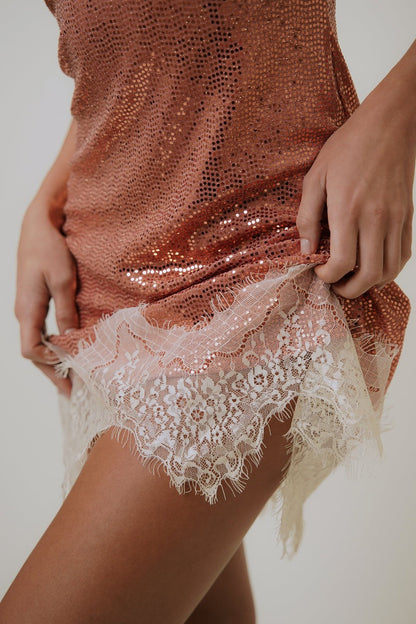 Pink - Women's evening mini slip dress featuring a shimmering sequin body and delicate contrast lace trim at the neckline and hem.