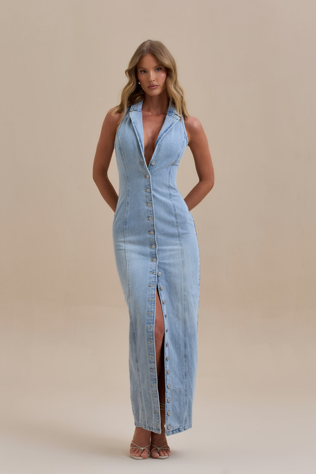 Blue - Women's form-fitting denim maxi dress featuring a halter neckline with lapel collar, full button-down front, and vertical tailored seams.