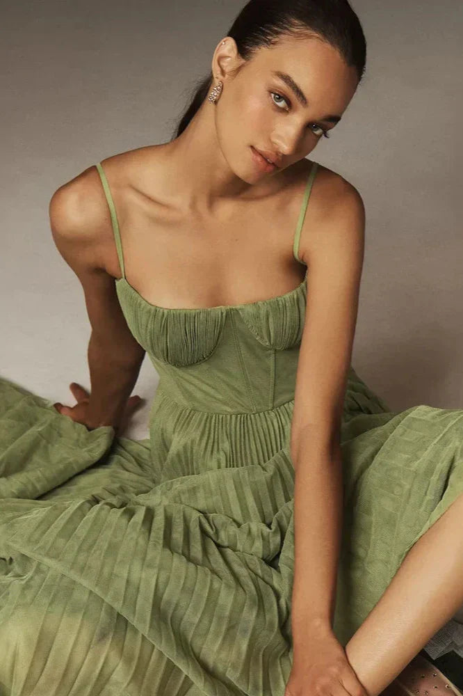 Green - Women's elegant green midi dress featuring a structured corset bodice with thin straps and a flowing, finely pleated skirt.