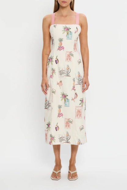 Women's midi-length column dress in cream featuring a vintage botanical stamp print, square neckline, and wide pink shoulder straps.
