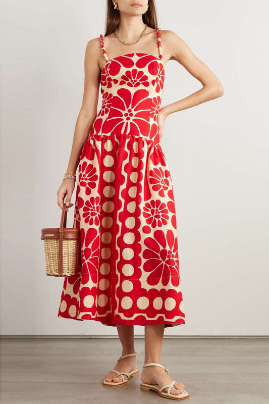 Red - Women's drop-waist midi dress featuring a bold oversized floral print, straight neckline, and artisanal beaded shoulder straps.