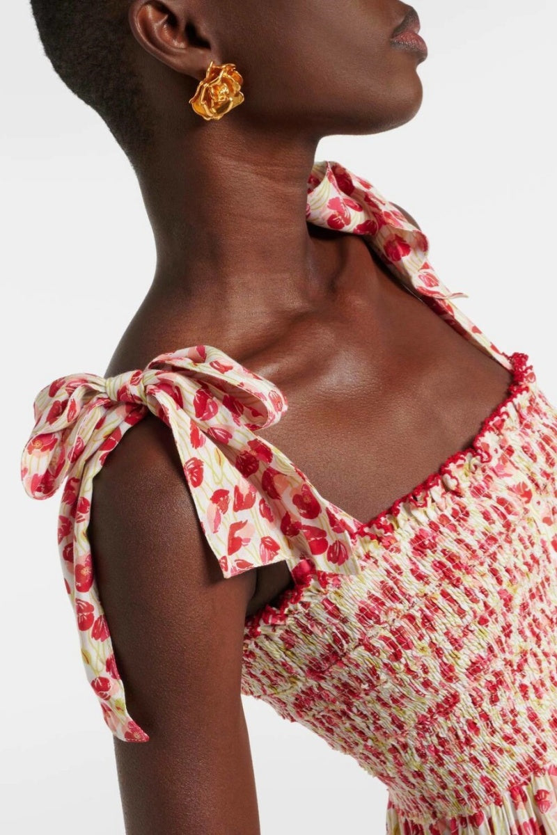 Red - Women's midi dress featuring a red floral print, smocked bodice, tie-shoulder straps, and a tiered skirt with button details.