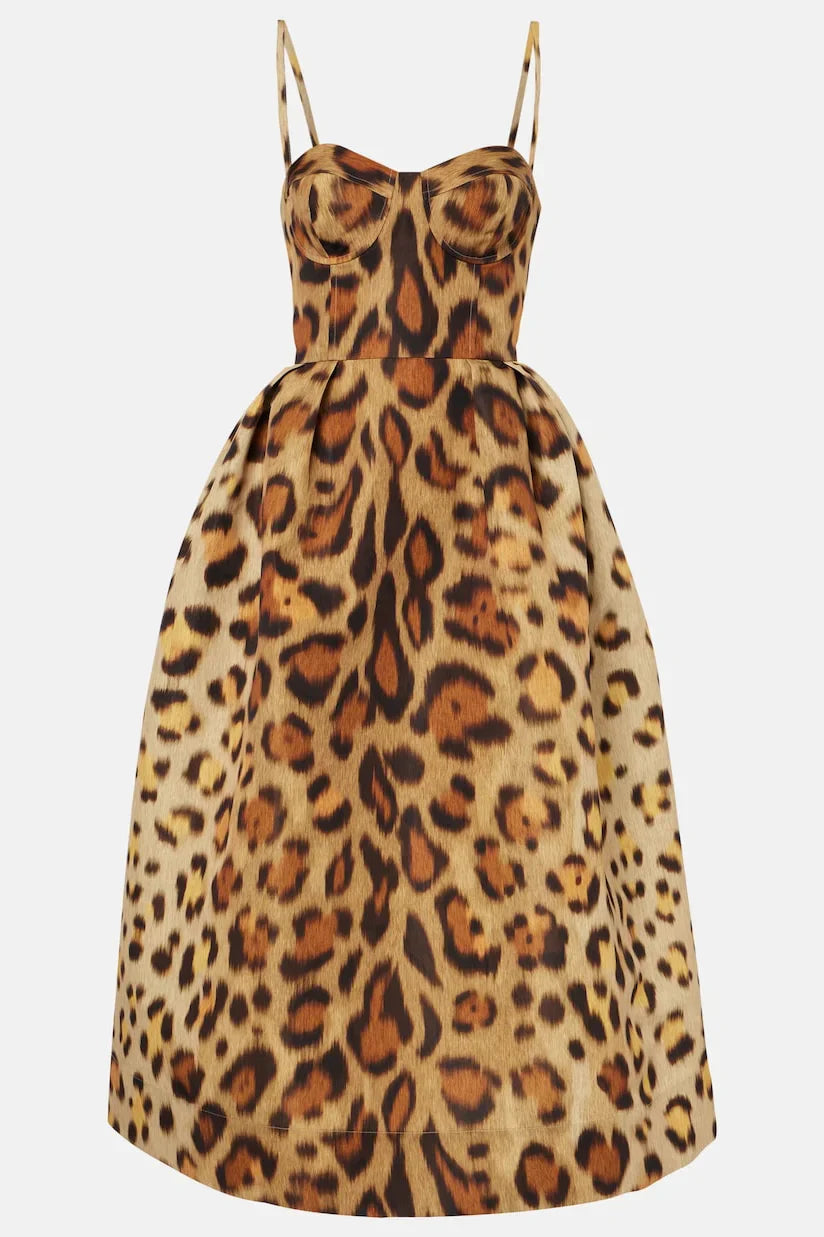 animal-print - A woman wearing a structured midi dress with a corset bodice and full A-line skirt in a bold leopard print.