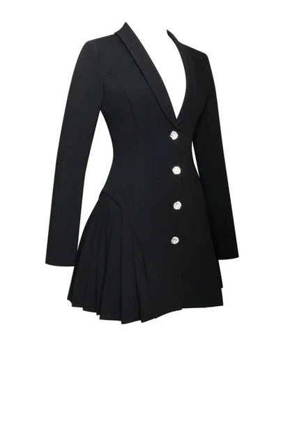 Black - A woman wearing a tailored black long-sleeved mini blazer dress with a deep V-neck, silver statement buttons, and a pleated skirt hem.