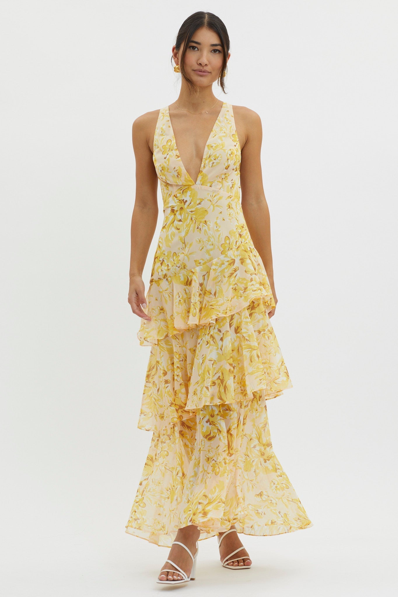 XXL - Women's elegant sleeveless maxi dress featuring a deep plunge neckline, dramatic tiered ruffle skirt, and a bold pink and red large-scale floral print.
