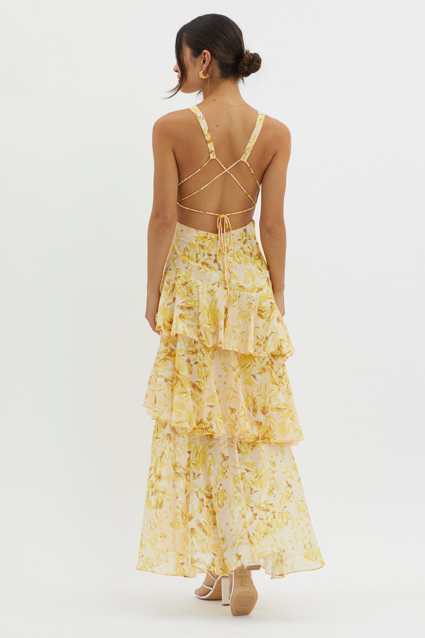 XXL - Women's elegant sleeveless maxi dress featuring a deep plunge neckline, dramatic tiered ruffle skirt, and a bold pink and red large-scale floral print.