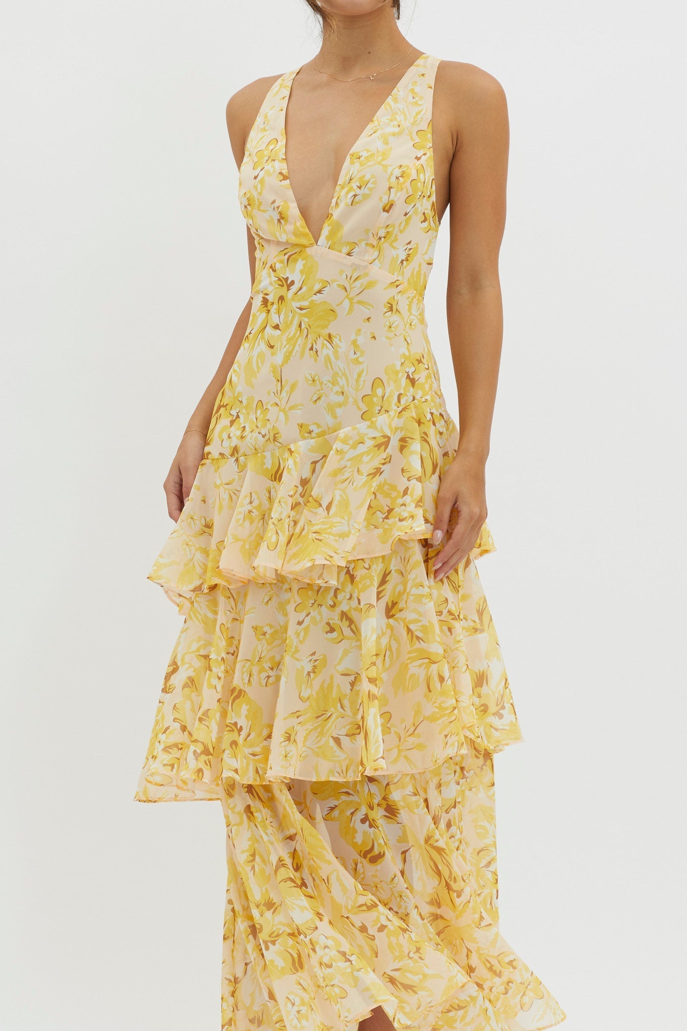 XXL - Women's elegant sleeveless maxi dress featuring a deep plunge neckline, dramatic tiered ruffle skirt, and a bold pink and red large-scale floral print.