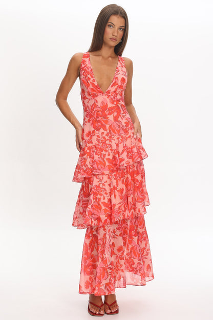 XXL - Women's elegant sleeveless maxi dress featuring a deep plunge neckline, dramatic tiered ruffle skirt, and a bold pink and red large-scale floral print.