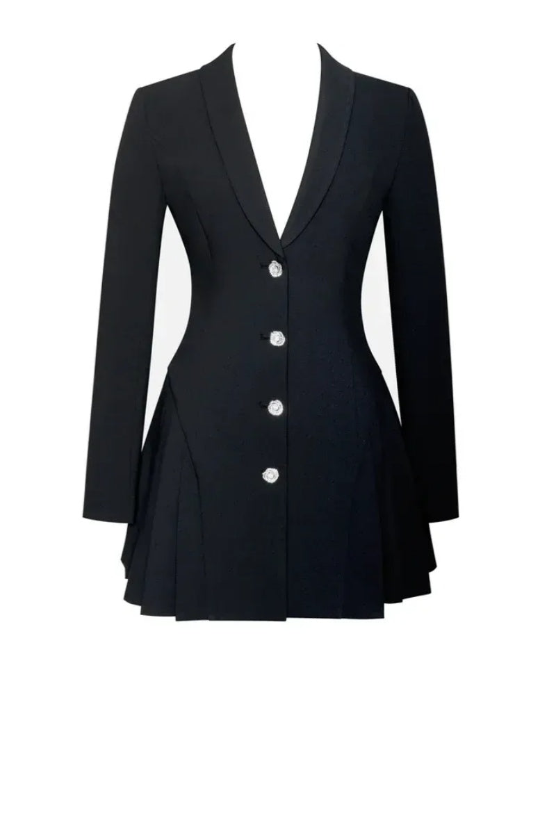 Black - A woman wearing a tailored black long-sleeved mini blazer dress with a deep V-neck, silver statement buttons, and a pleated skirt hem.