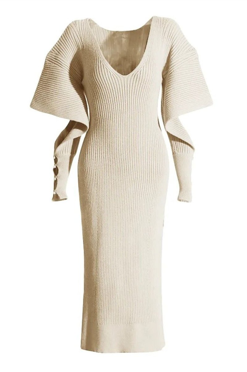 White - A woman modeling a cream ribbed knit midi dress with a V-neckline and dramatic split fluted sleeves, holding a brown leather clutch.