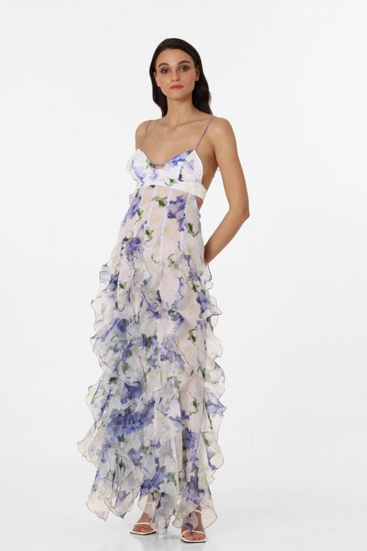 Blue - Women's white maxi dress featuring a purple watercolour floral print, delicate straps, waist cut-outs, and a semi-sheer skirt with cascading ruffles.