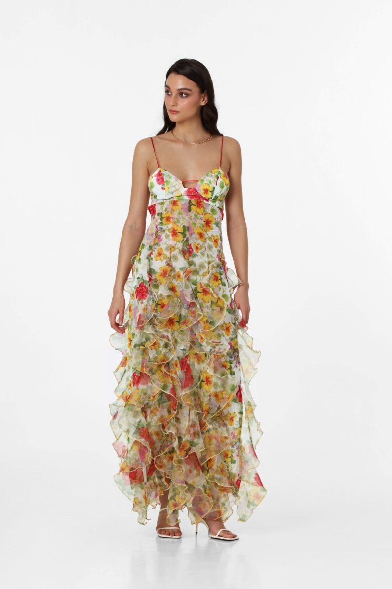 Multi - Women's white maxi dress featuring a purple watercolour floral print, delicate straps, waist cut-outs, and a semi-sheer skirt with cascading ruffles.