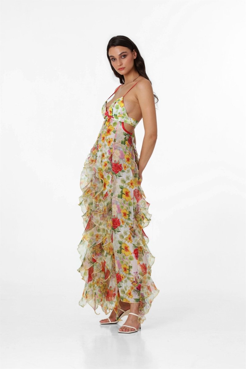 Multi - Women's white maxi dress featuring a purple watercolour floral print, delicate straps, waist cut-outs, and a semi-sheer skirt with cascading ruffles.