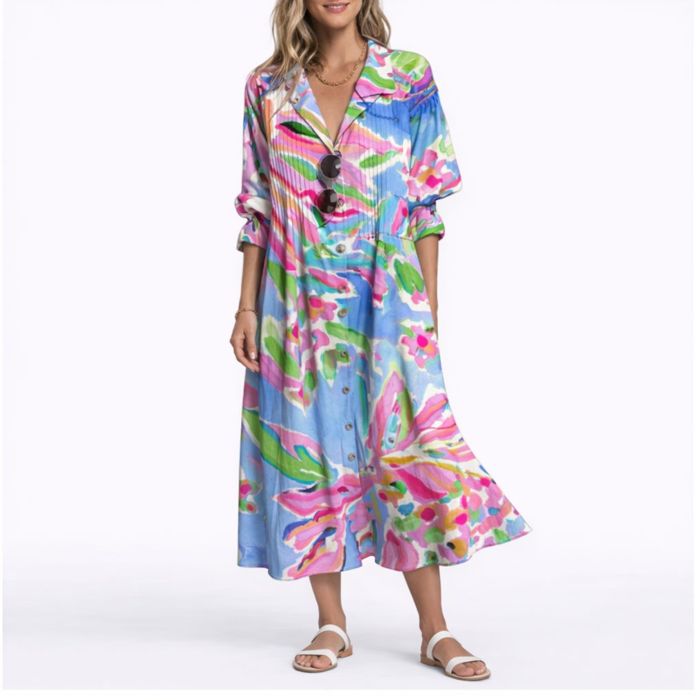 Pink - Woman wearing a relaxed botanical print midi shirt dress with a collar, front buttons, and 3/4 sleeves.