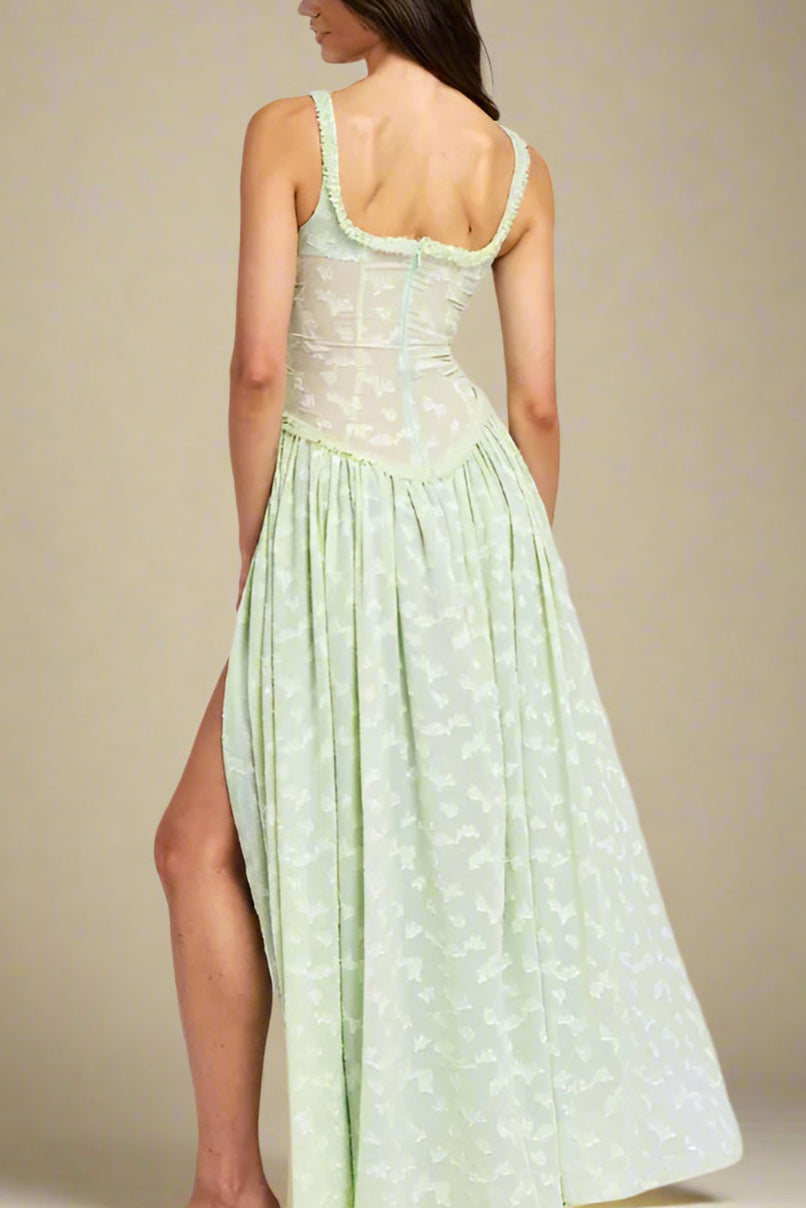 SeaGreen - Women's light green maxi dress featuring a corset-style bodice, ruched bust, high side slit, and a subtle textured floral pattern.