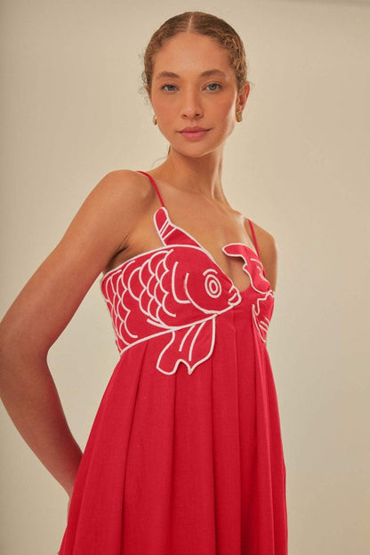 Red - Women's bright red flowing maxi dress featuring delicate spaghetti straps and a unique white embroidered fish design across the bodice.