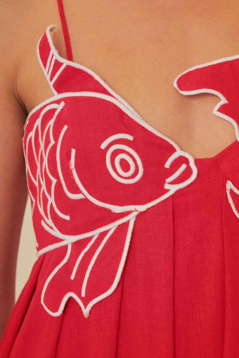 Red - Women's bright red flowing maxi dress featuring delicate spaghetti straps and a unique white embroidered fish design across the bodice.