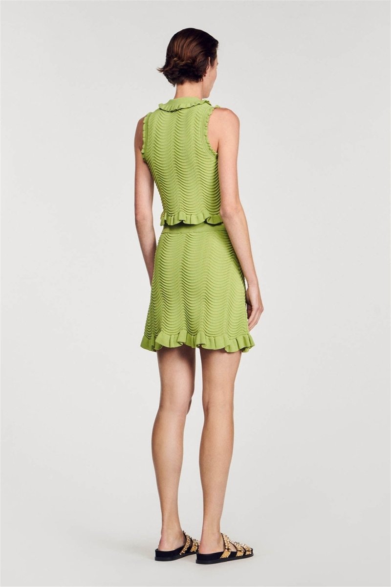 Green - Women's matching two-piece set featuring a sleeveless, collared crop top with gold buttons and a high-waisted mini skirt, both designed in a wavy textured knit with ruffle trims.