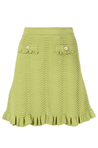 Green - Women's matching two-piece set featuring a sleeveless, collared crop top with gold buttons and a high-waisted mini skirt, both designed in a wavy textured knit with ruffle trims.