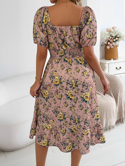 Pink - Woman wearing a floral print off-the-shoulder midi dress with a smocked waist and short puff sleeves, holding a woven straw bag