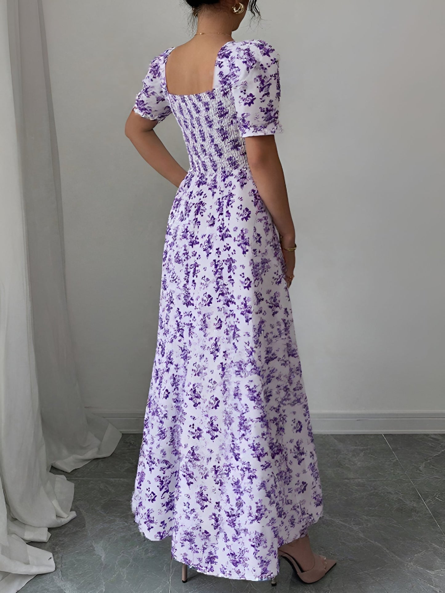Light Purple - Woman wearing a floral print midaxi dress with puff sleeves, a square neckline, and a ruched bust detail.