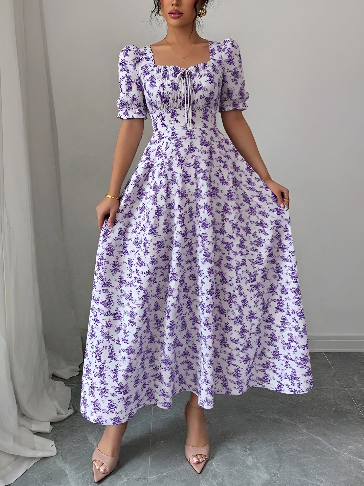 Light Purple - Woman wearing a floral print midaxi dress with puff sleeves, a square neckline, and a ruched bust detail.
