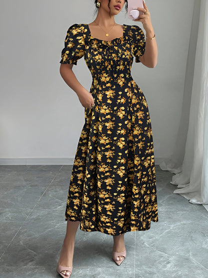 Gold - Woman wearing a floral print midaxi dress with puff sleeves, a square neckline, and a ruched bust detail.