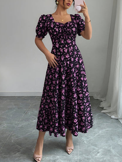 Dark Purple - Woman wearing a floral print midaxi dress with puff sleeves, a square neckline, and a ruched bust detail.