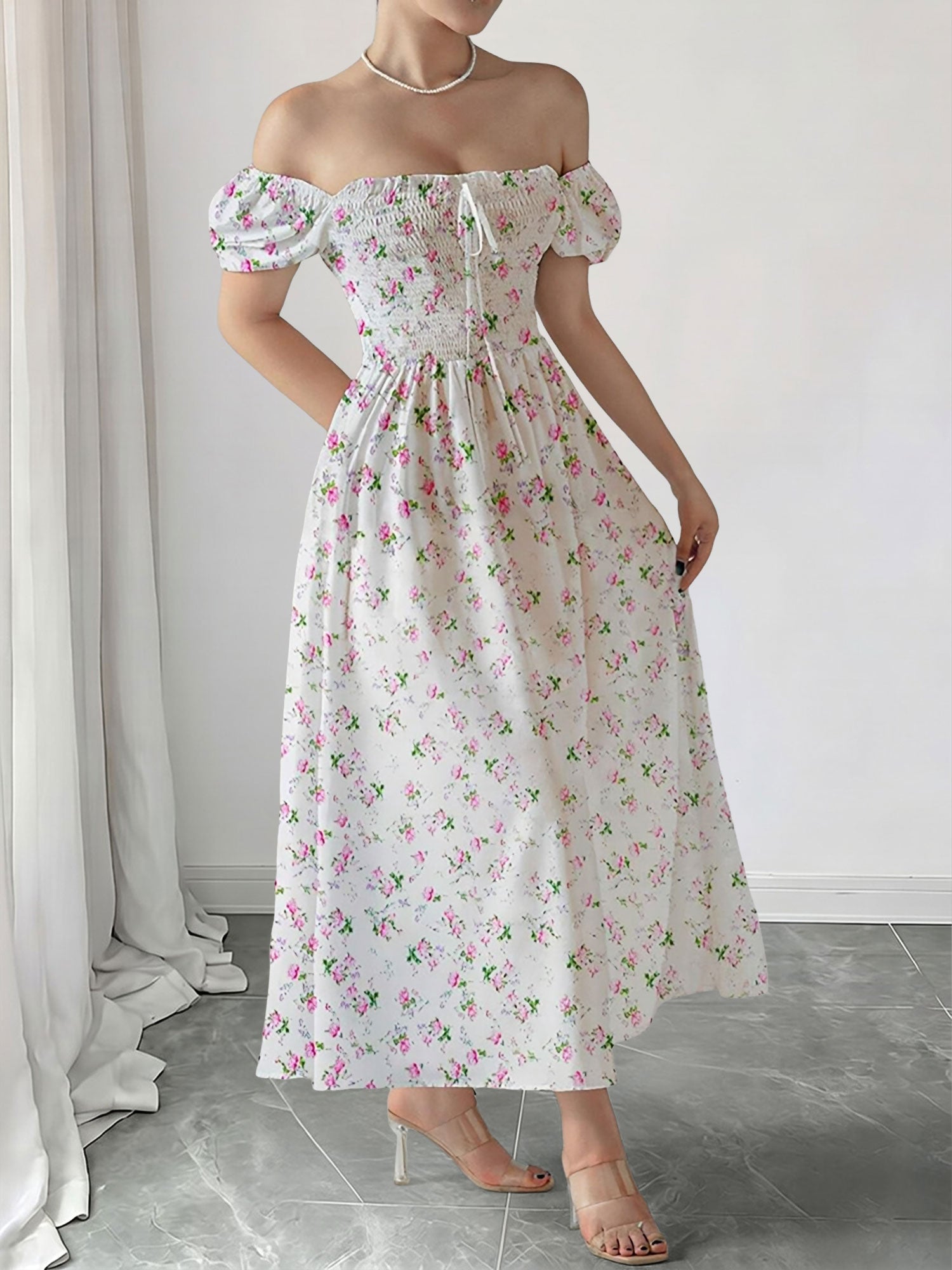 Pink - Woman wearing a woven floral square-neck midi dress with short puff sleeves and a shirred bodice
