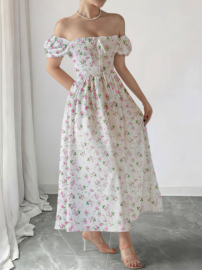 Pink - Woman wearing a woven floral square-neck midi dress with short puff sleeves and a shirred bodice