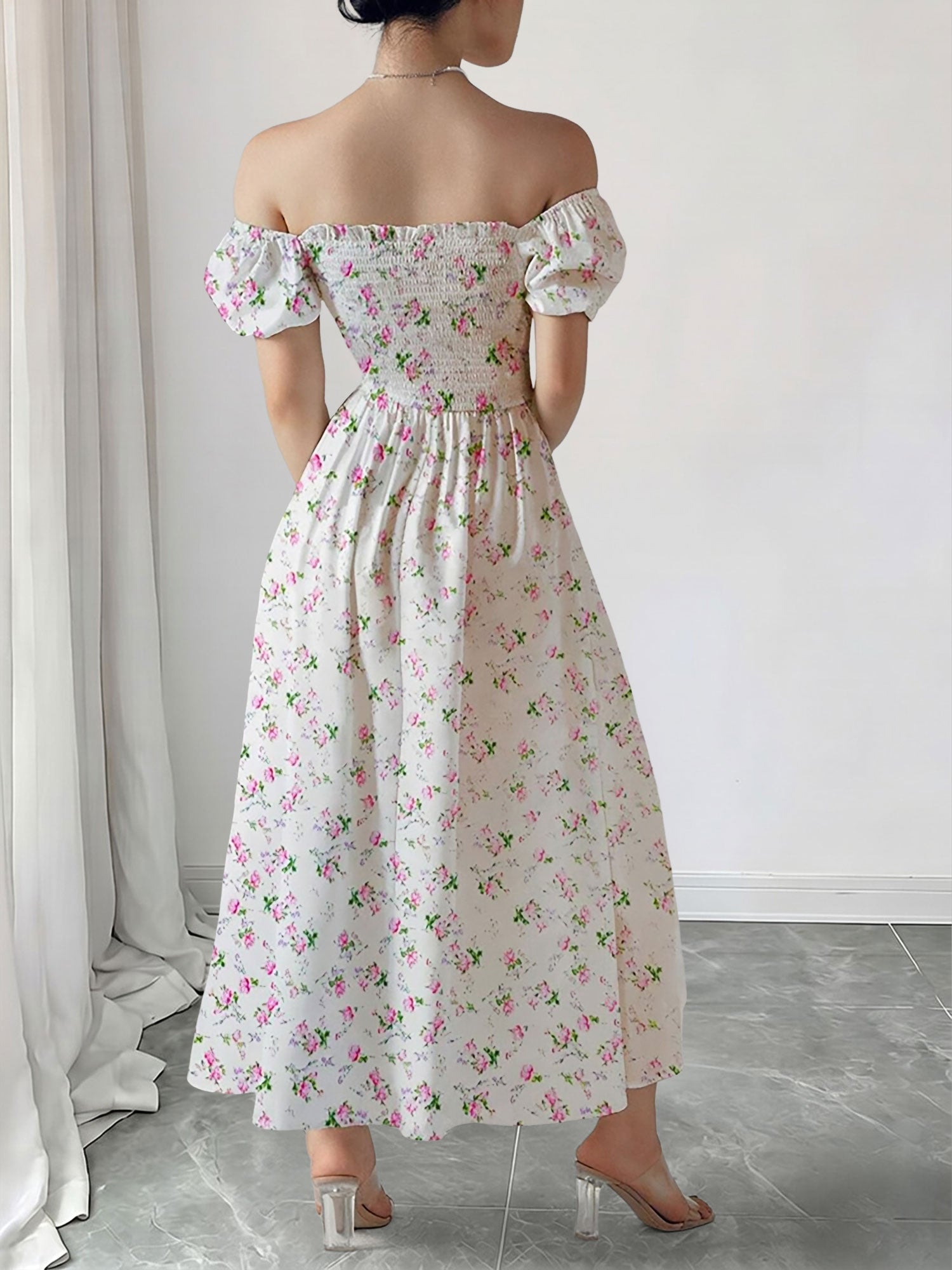 Pink - Woman wearing a woven floral square-neck midi dress with short puff sleeves and a shirred bodice