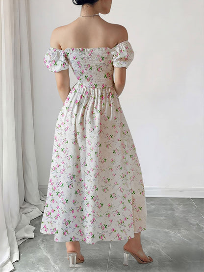 Pink - Woman wearing a woven floral square-neck midi dress with short puff sleeves and a shirred bodice