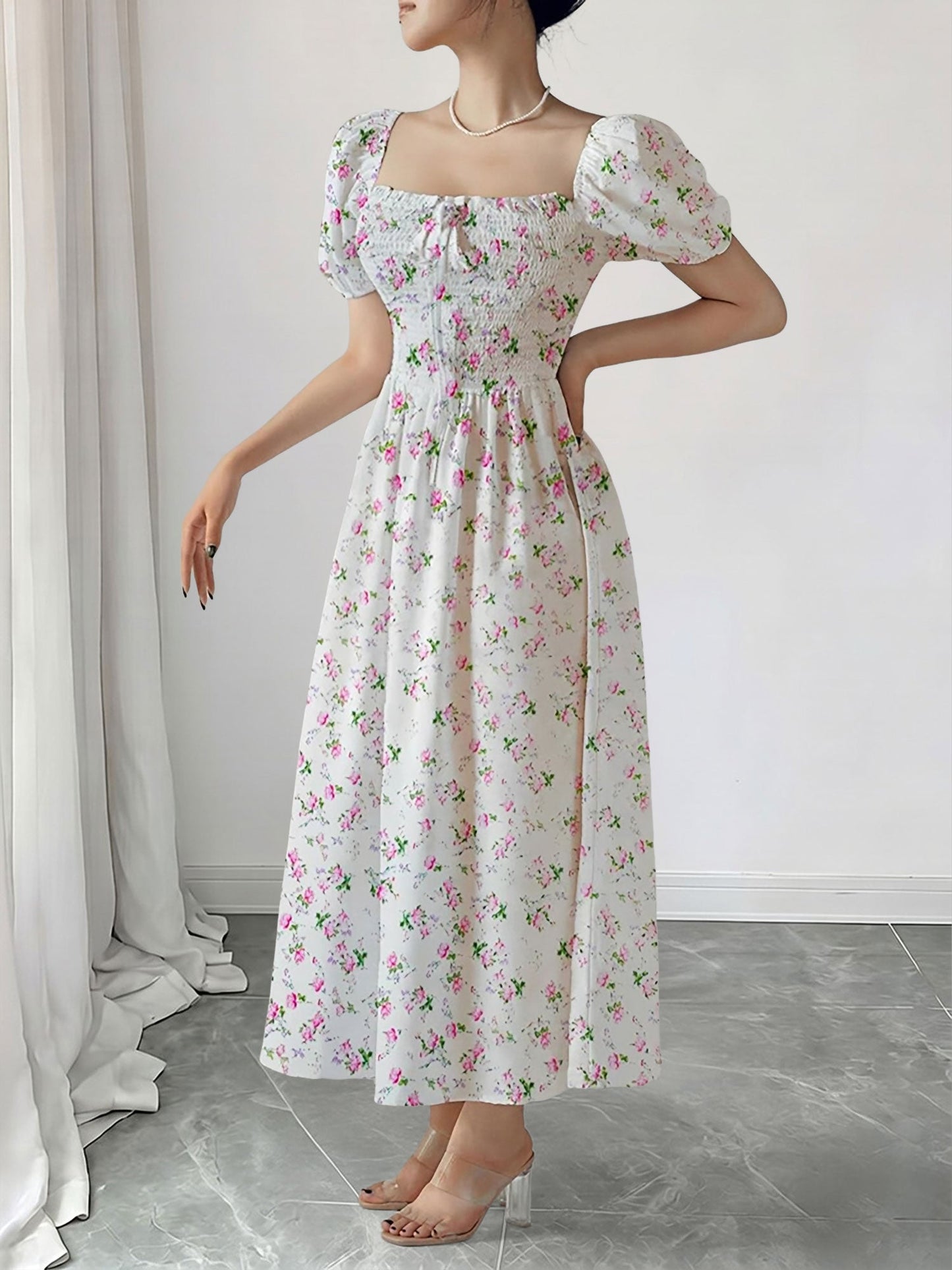 Pink - Woman wearing a woven floral square-neck midi dress with short puff sleeves and a shirred bodice