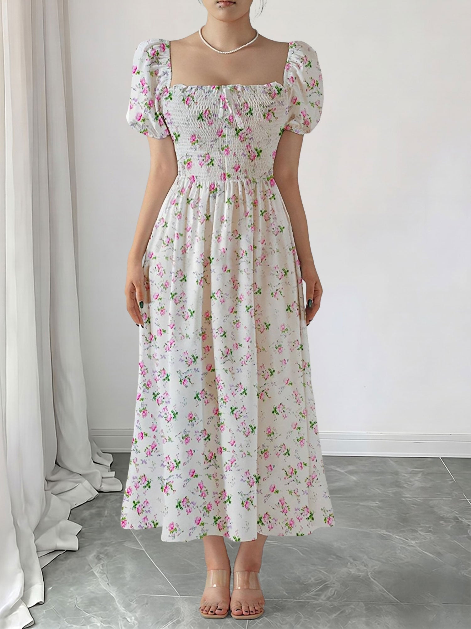Pink - Woman wearing a woven floral square-neck midi dress with short puff sleeves and a shirred bodice