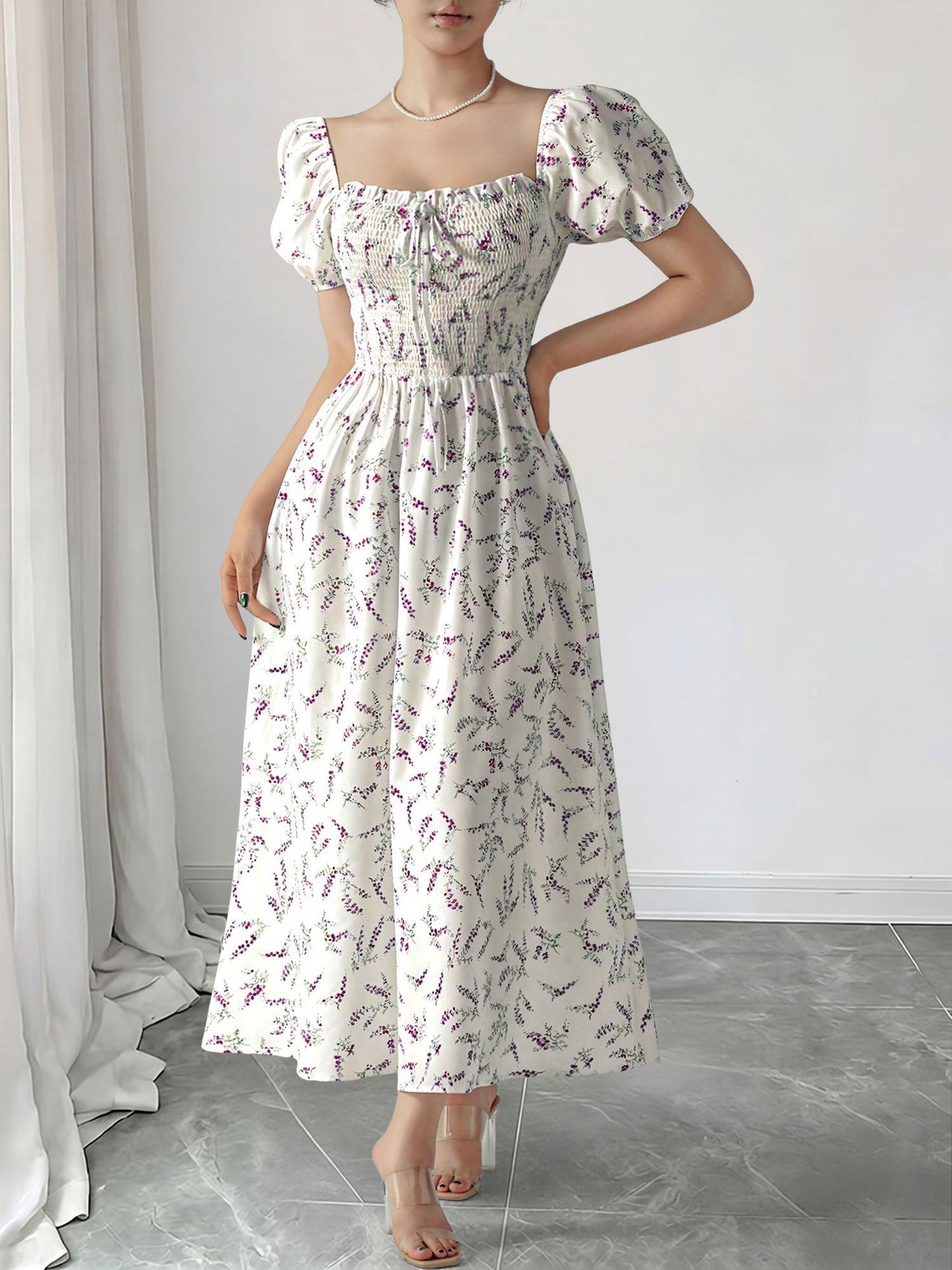 Purple - Woman wearing a woven floral square-neck midi dress with short puff sleeves and a shirred bodice