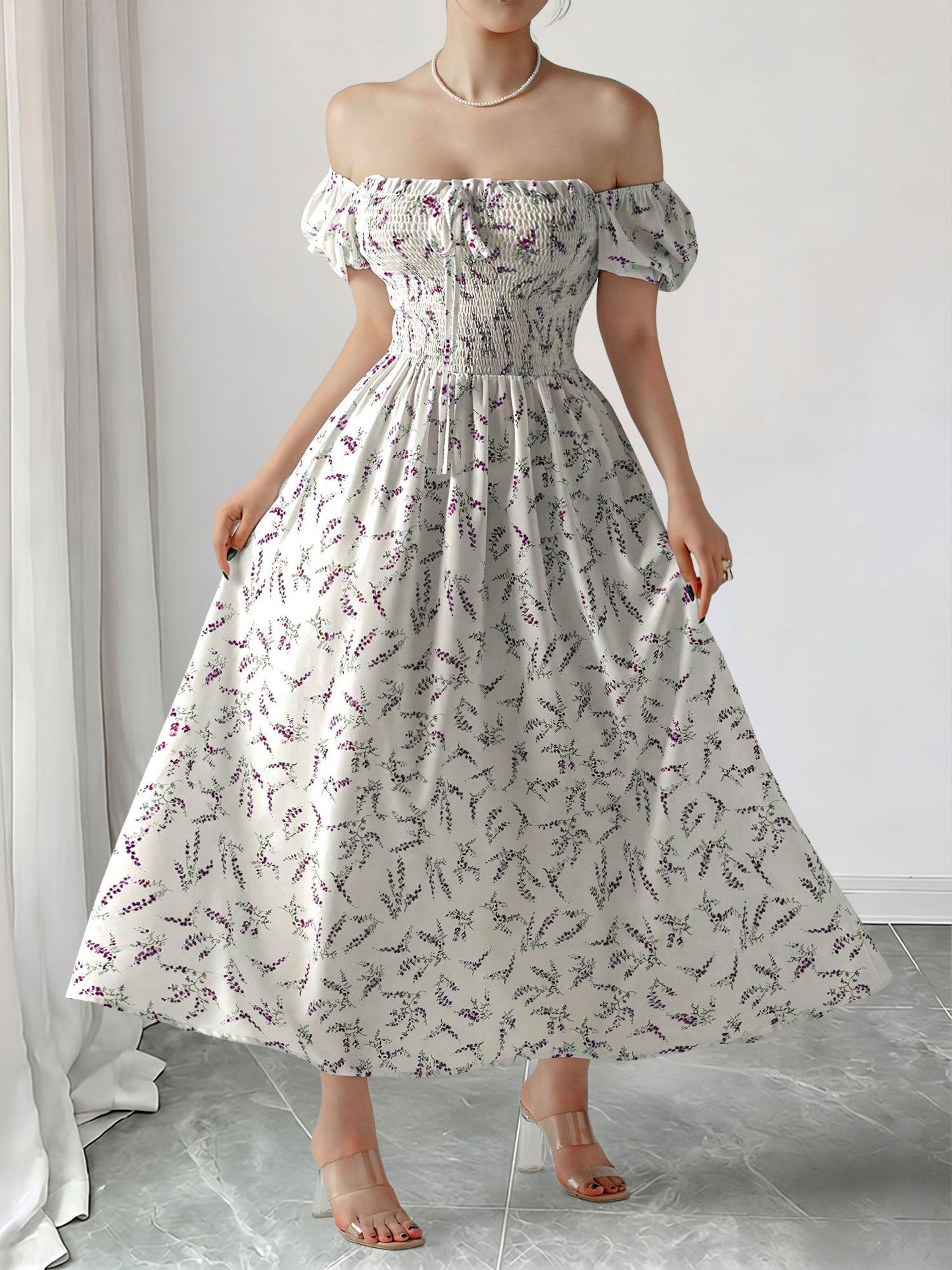 Purple - Woman wearing a woven floral square-neck midi dress with short puff sleeves and a shirred bodice