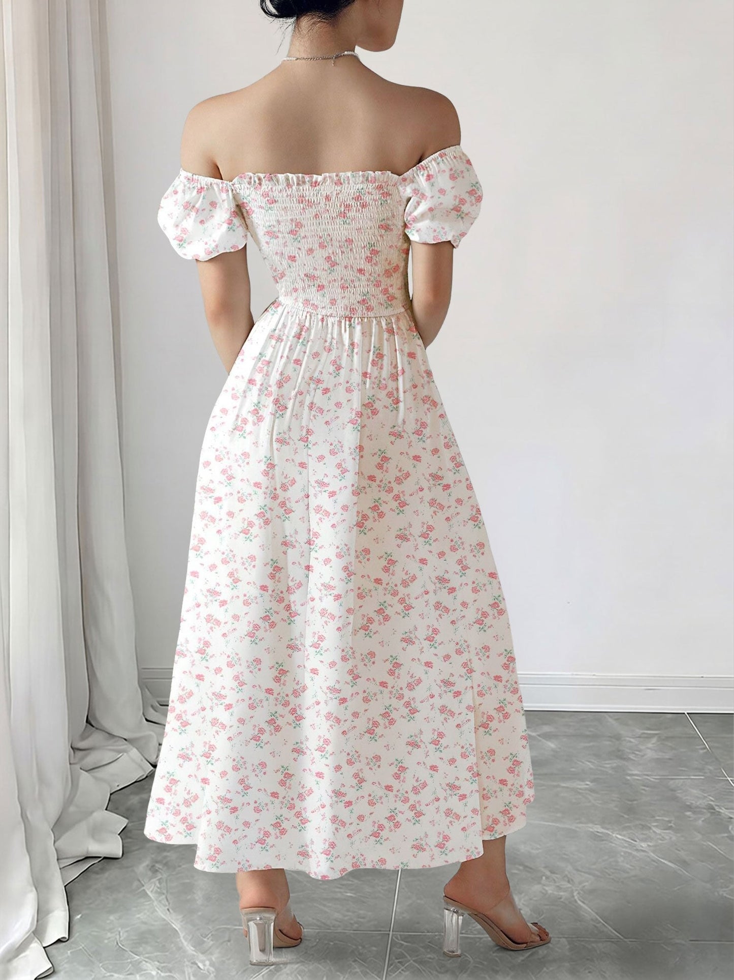 Light Pink - Woman wearing a woven floral square-neck midi dress with short puff sleeves and a shirred bodice