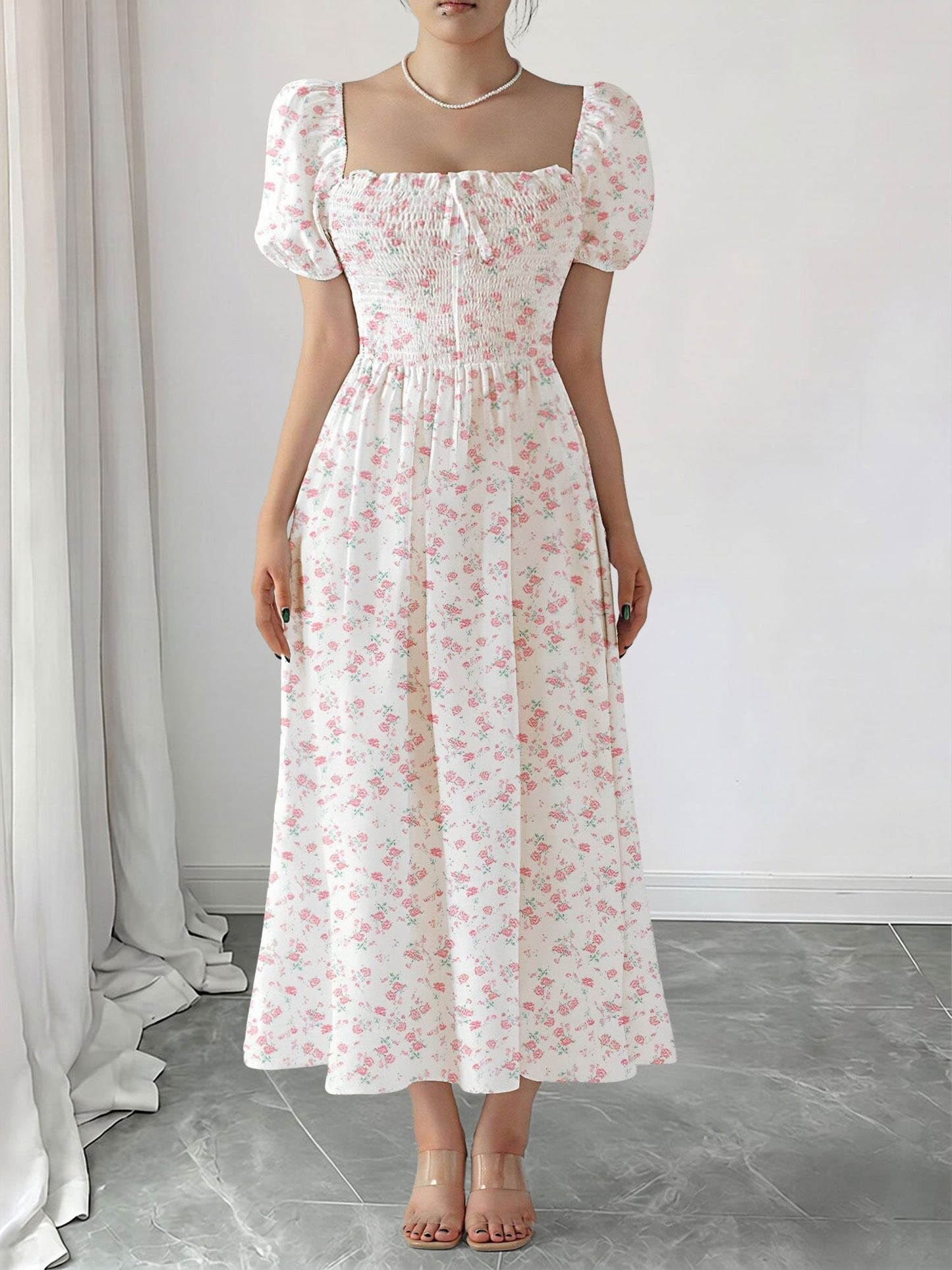 Light Pink - Woman wearing a woven floral square-neck midi dress with short puff sleeves and a shirred bodice