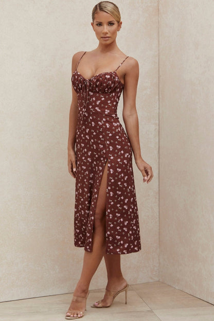 Claret - Women's brown midi dress featuring a ditsy floral print, ruched bust with tie detail, spaghetti straps, and a high thigh slit.