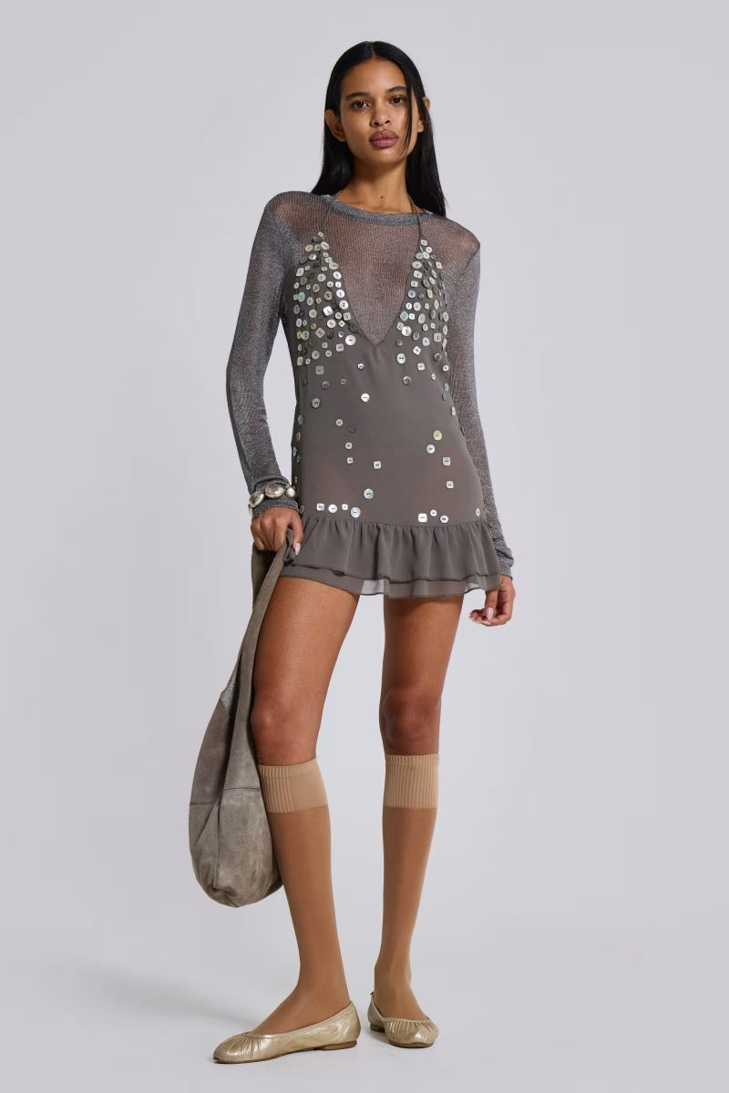Grey - Women's grey halter neck mini dress featuring a deep plunging neckline, scattered button embellishments, an open back, and a tiered ruffle hem.