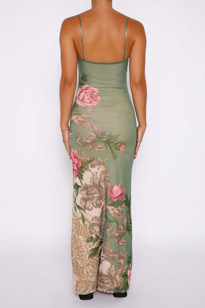 Olive - Women's form-fitting green slip maxi dress featuring a large pink floral and ornate botanical print, styled with delicate spaghetti straps.