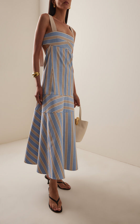 Women's light blue, beige, and brown striped midi dress featuring wide textured straps, side waist cutouts, and a panelled A-line skirt creating a chevron stripe effect.