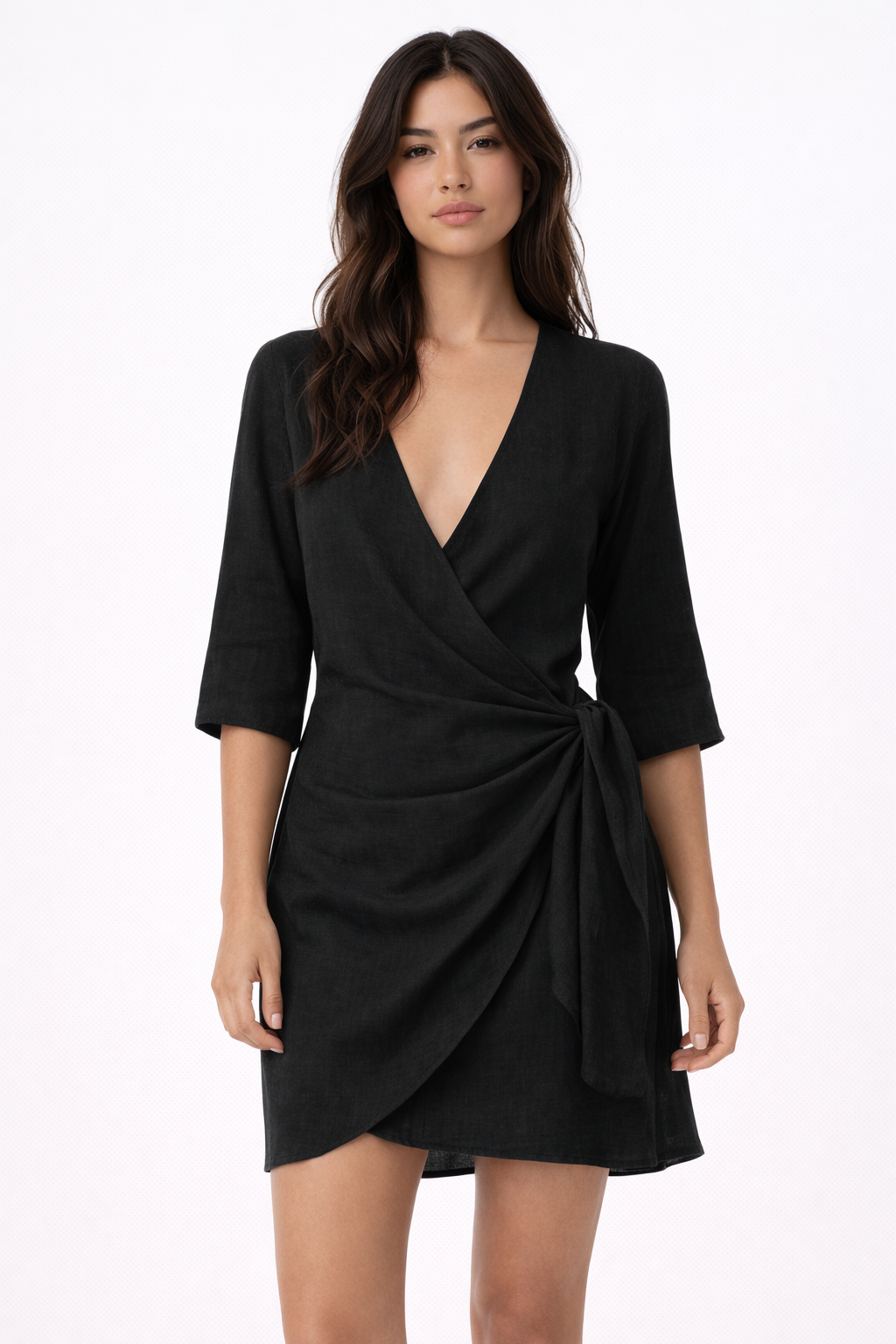 Black - Model wearing a woven wrap mini dress with three-quarter sleeves and an adjustable side tie