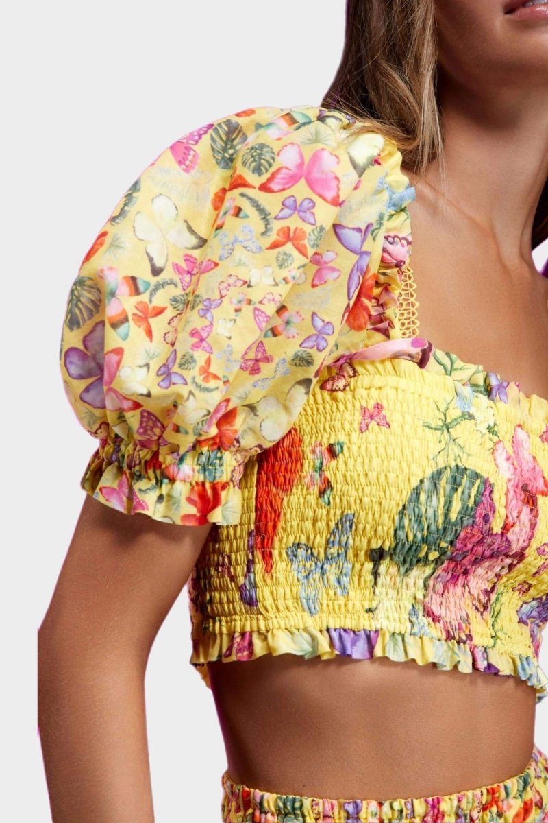 Yellow - Women's white cropped blouse featuring a colourful butterfly and botanical print, a shirred bodice, square neckline, and short puff sleeves, paired with a matching tiered mini skirt.